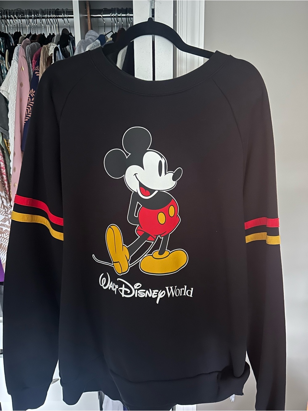 Disney Black Crewneck Sweatshirt with Mickey Graphic and Red/Yellow Accents